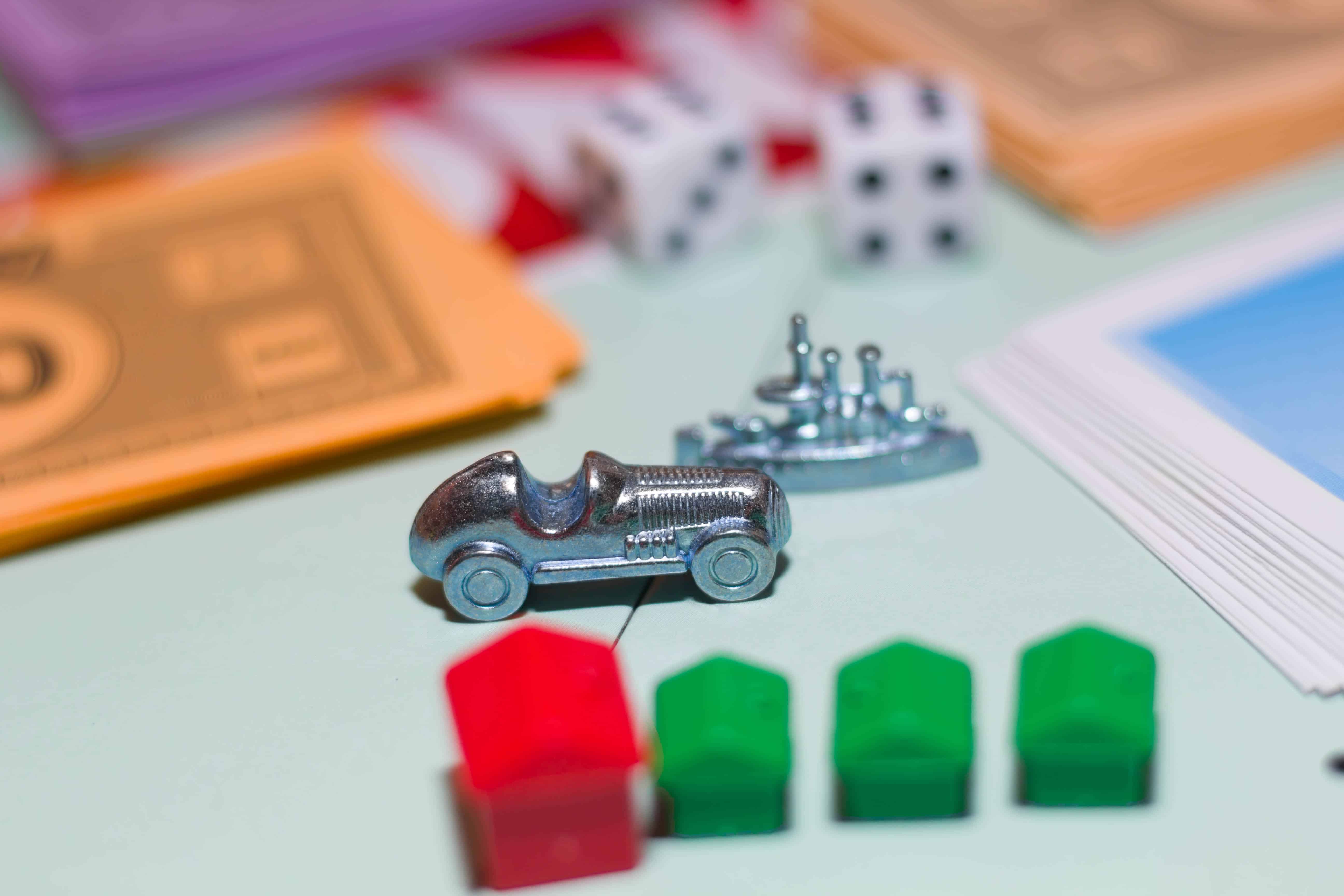 Game monopoly close up. Game chips, game cubes