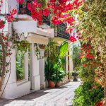 A-picturesque-and-narrow-street-in-Marbella-old-town,-province-of-Malaga,-Andalusia,-Spain.