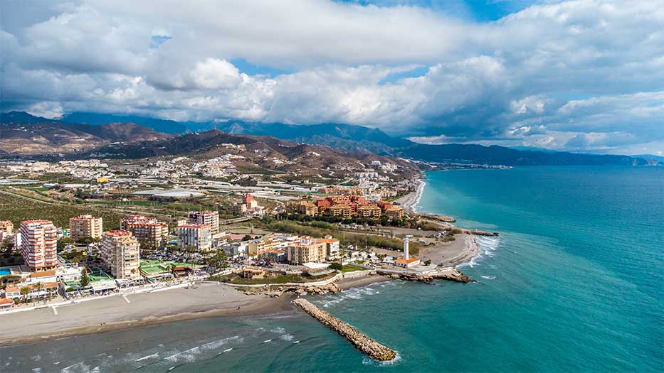 Drone perspective of costal city of Torrox situated in Malaga, Costa del Sol, Spain