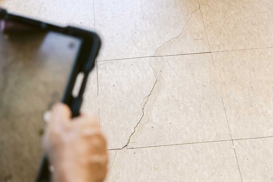 Cracked garage floor of a residential home
